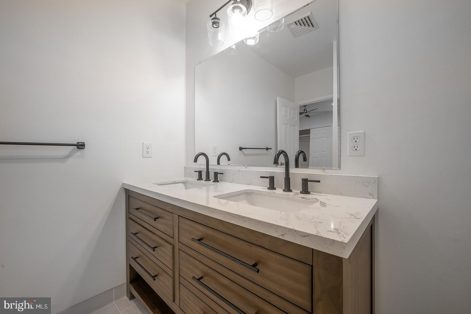 42 North Waterloo Road, Unit 38 Devon, PA 19333 - Photo 19 of 31 Full bath with 2 sinks