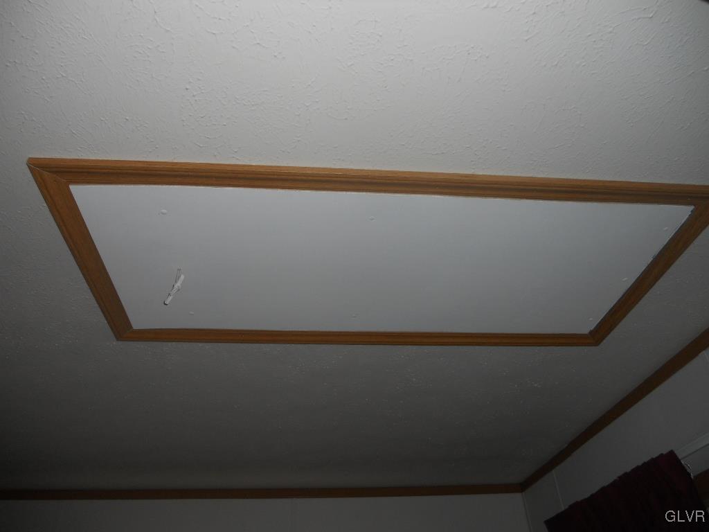 8733 Turkey Ridge Road Breinigsville, PA 18031 - Photo 17 of 19 a view of a room with an empty space and a window