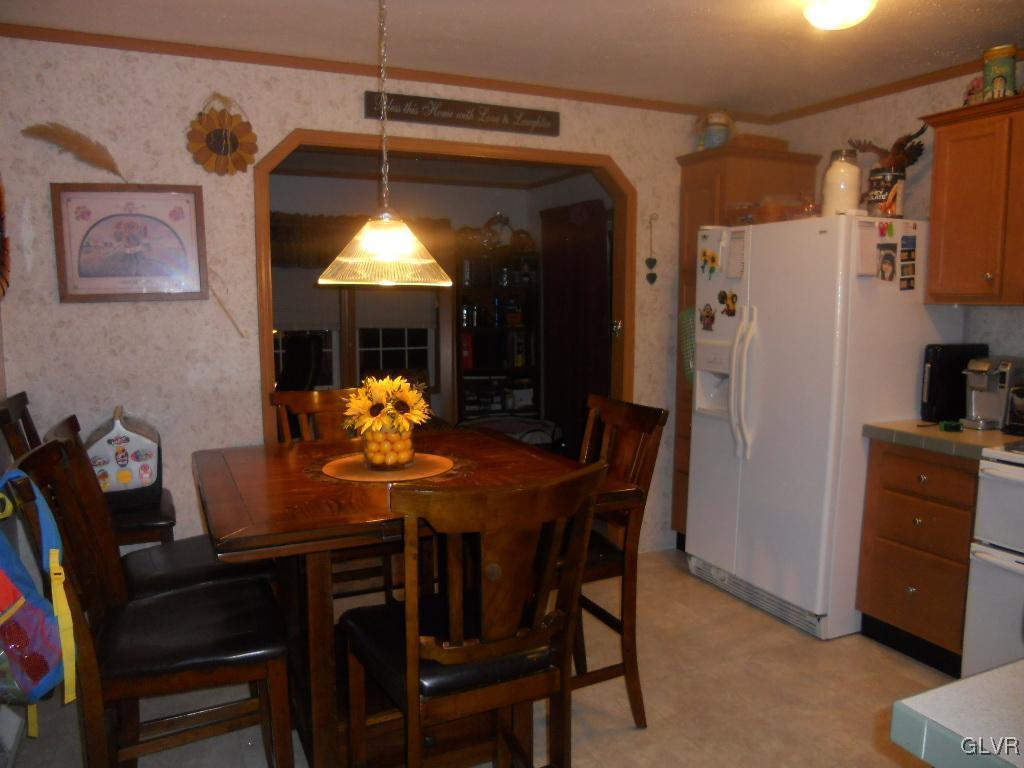 8733 Turkey Ridge Road Breinigsville, PA 18031 - Photo 4 of 19 a dining room with furniture and window