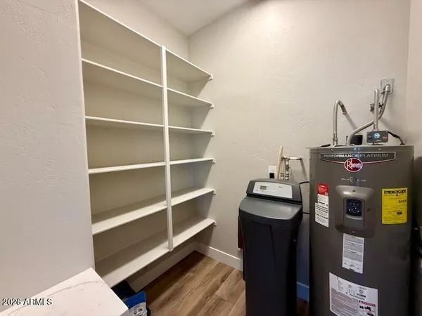 a view of a workspace with furniture