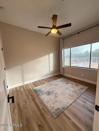a view of an empty room and window