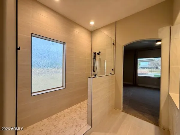 a view of a hallway with front door