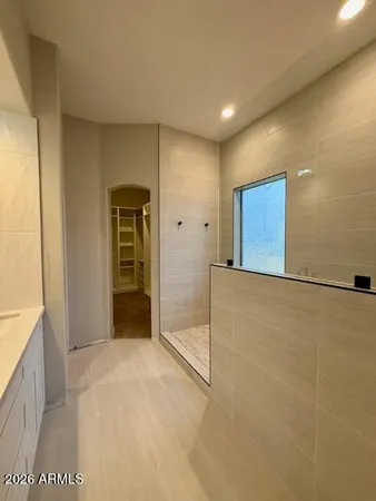 a view of an empty walk in closet