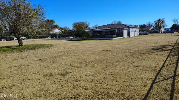 a view of a backyard and mountain