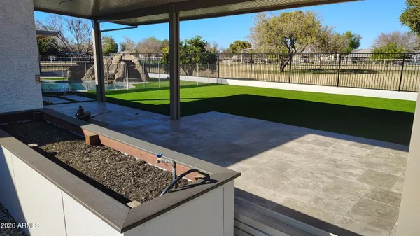 a swimming pool view with a outdoor space