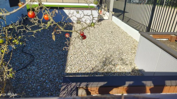 a view of front door and a yard