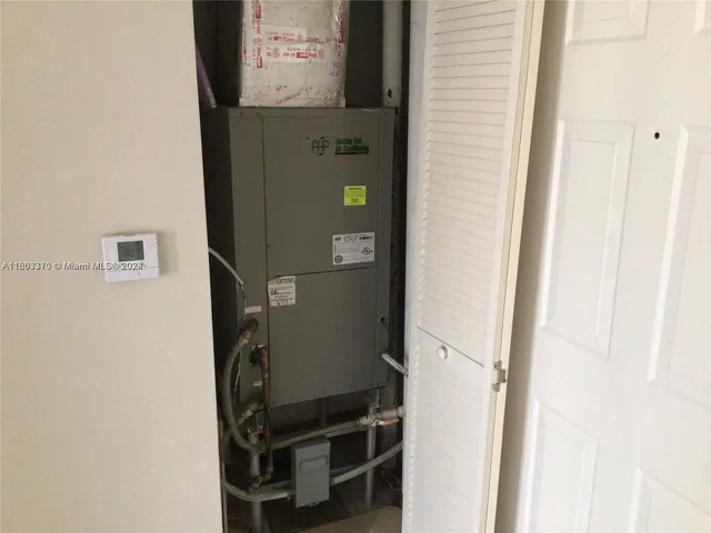 a room with window and a table