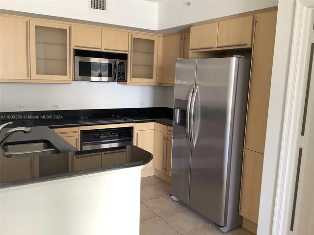 a bathroom with a toilet and a bathtub