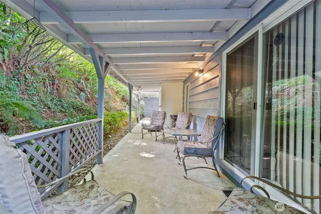 a view of a two chair in the balcony