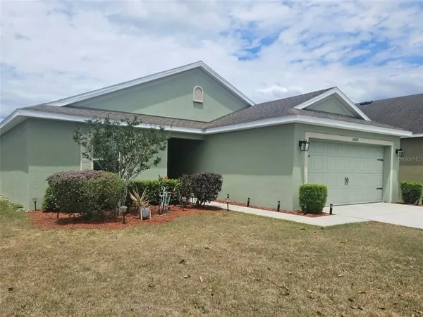 front view of a house with yard