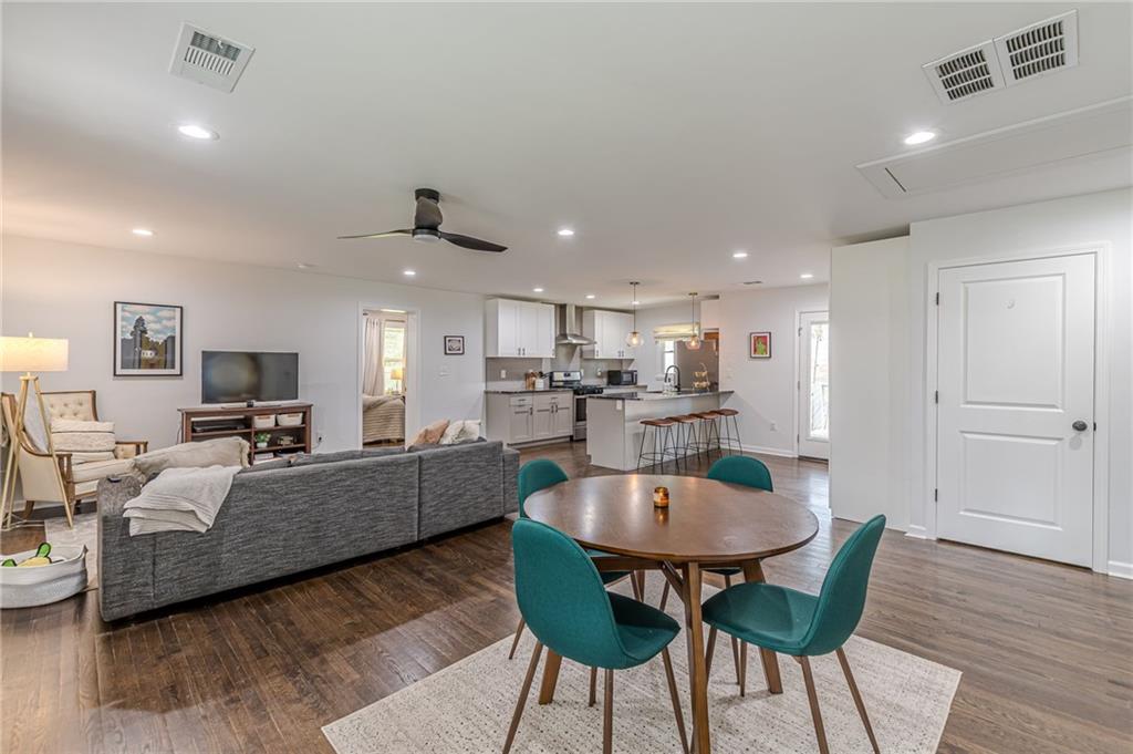 1692 Derrill Drive Decatur, GA 30032 - Photo 12 of 29 a view of a dining room with furniture and wooden floor