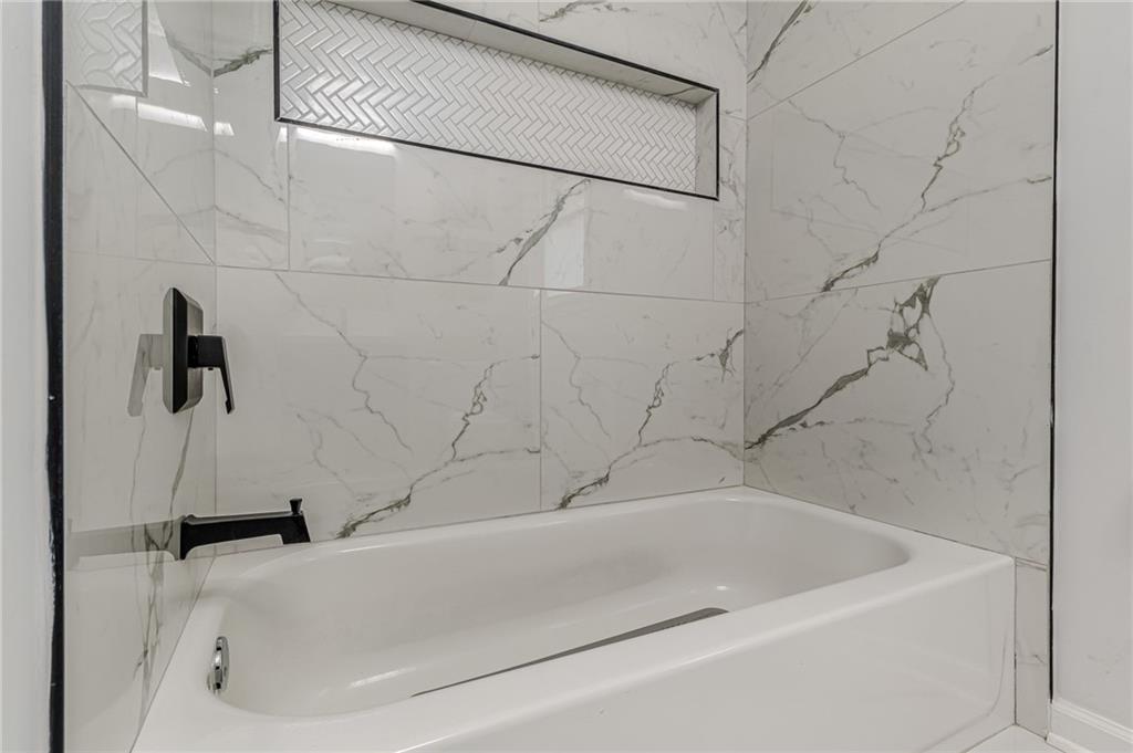 1692 Derrill Drive Decatur, GA 30032 - Photo 16 of 29 a bathroom with a bathtub