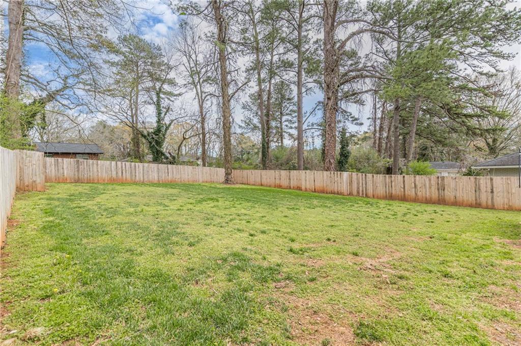 1692 Derrill Drive Decatur, GA 30032 - Photo 26 of 29 a view of outdoor space with deck and trees