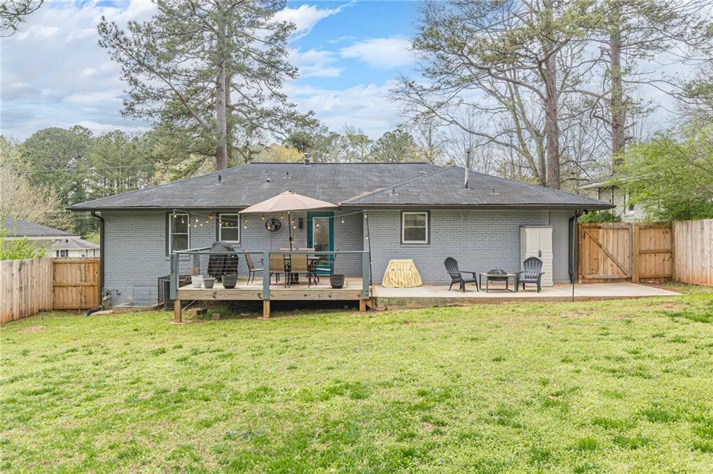 1692 Derrill Drive Decatur, GA 30032 - Photo 27 of 29 a view of a house with pool and chairs