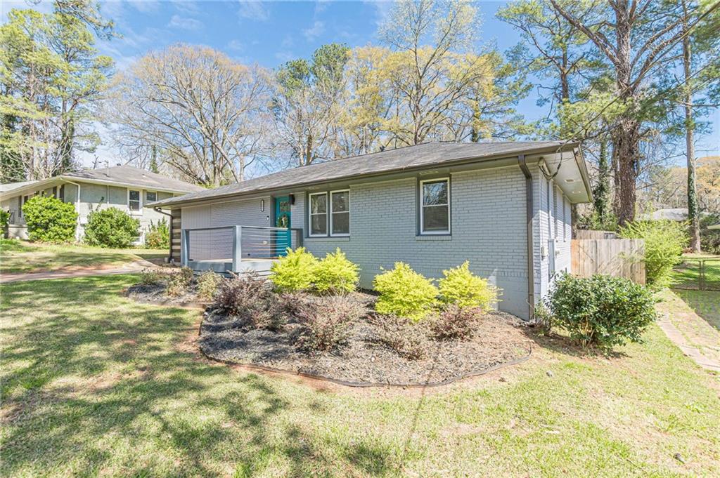 1692 Derrill Drive Decatur, GA 30032 - Photo 28 of 29 a front view of a house with garden