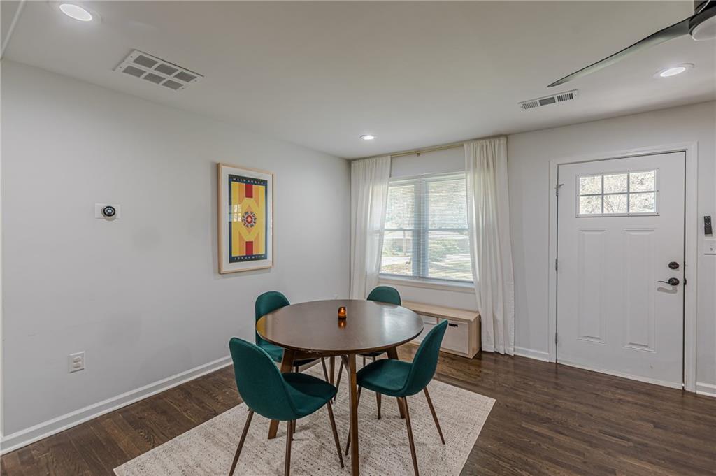 1692 Derrill Drive Decatur, GA 30032 - Photo 10 of 29 a view of a dining room with furniture and wooden floor