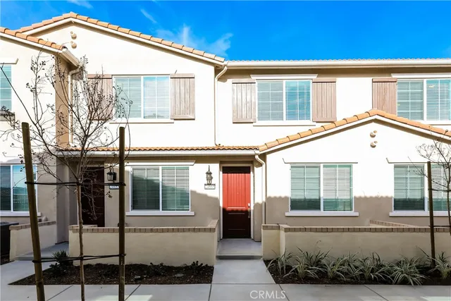 a front view of a house with a porch