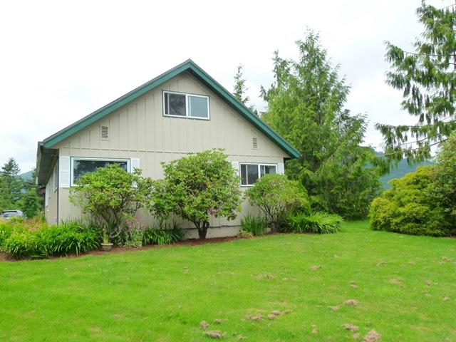 503 Hodgdon Road Tillamook, OR 97141 - Photo 26 of 43 a view of a house with backyard and garden
