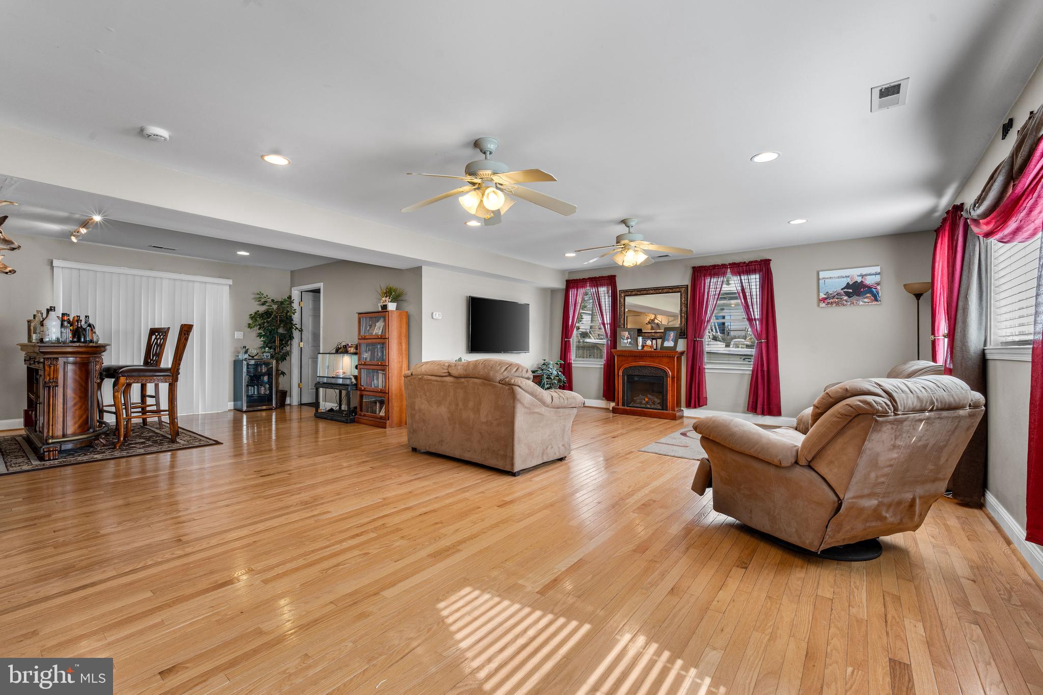 910 Hilltop Road Curtis Bay, MD 21226 - Photo 7 of 28 a living room with furniture and wooden floor