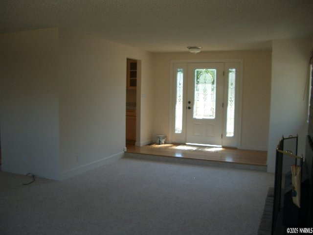 13905 Chamy Drive Reno, NV 89521 - Photo 3 of 9 an empty room with a window