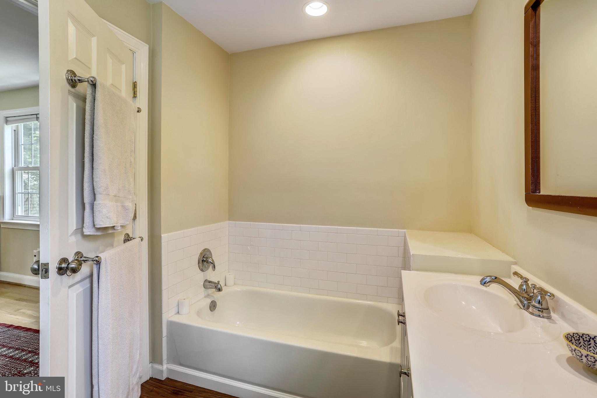 8636 Melwood Road Bethesda, MD 20817 - Photo 16 of 36 Master Bath w Tub & Separate Shower