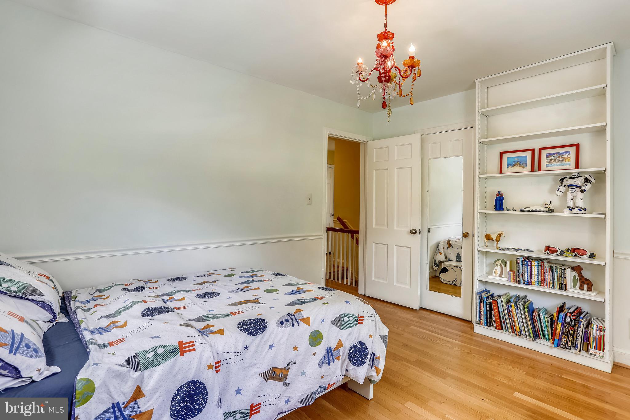 8636 Melwood Road Bethesda, MD 20817 - Photo 23 of 36 Bedroom w Built-in Bookshelves