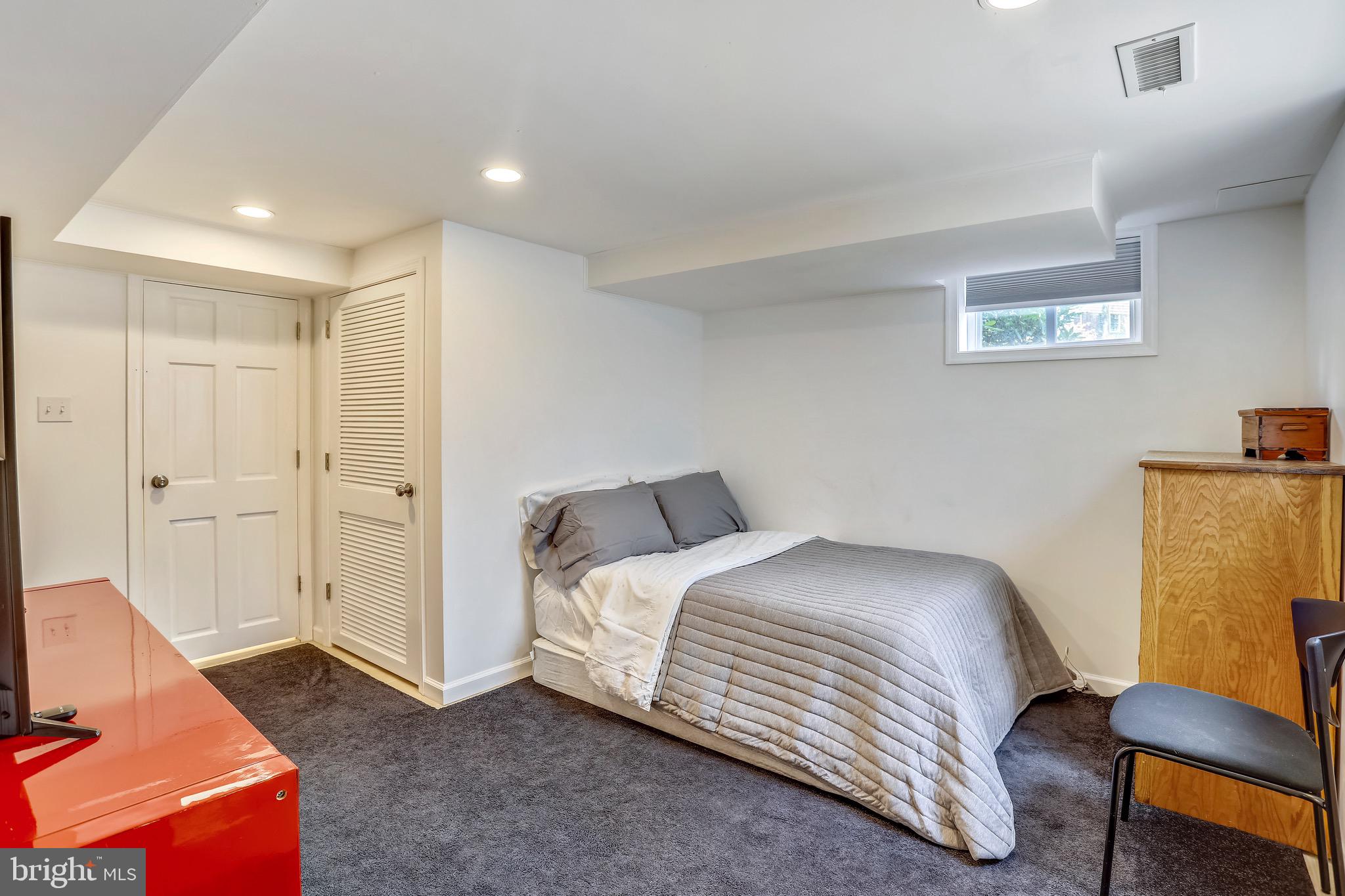 8636 Melwood Road Bethesda, MD 20817 - Photo 26 of 36 Lower Level Bedroom w Natural Light