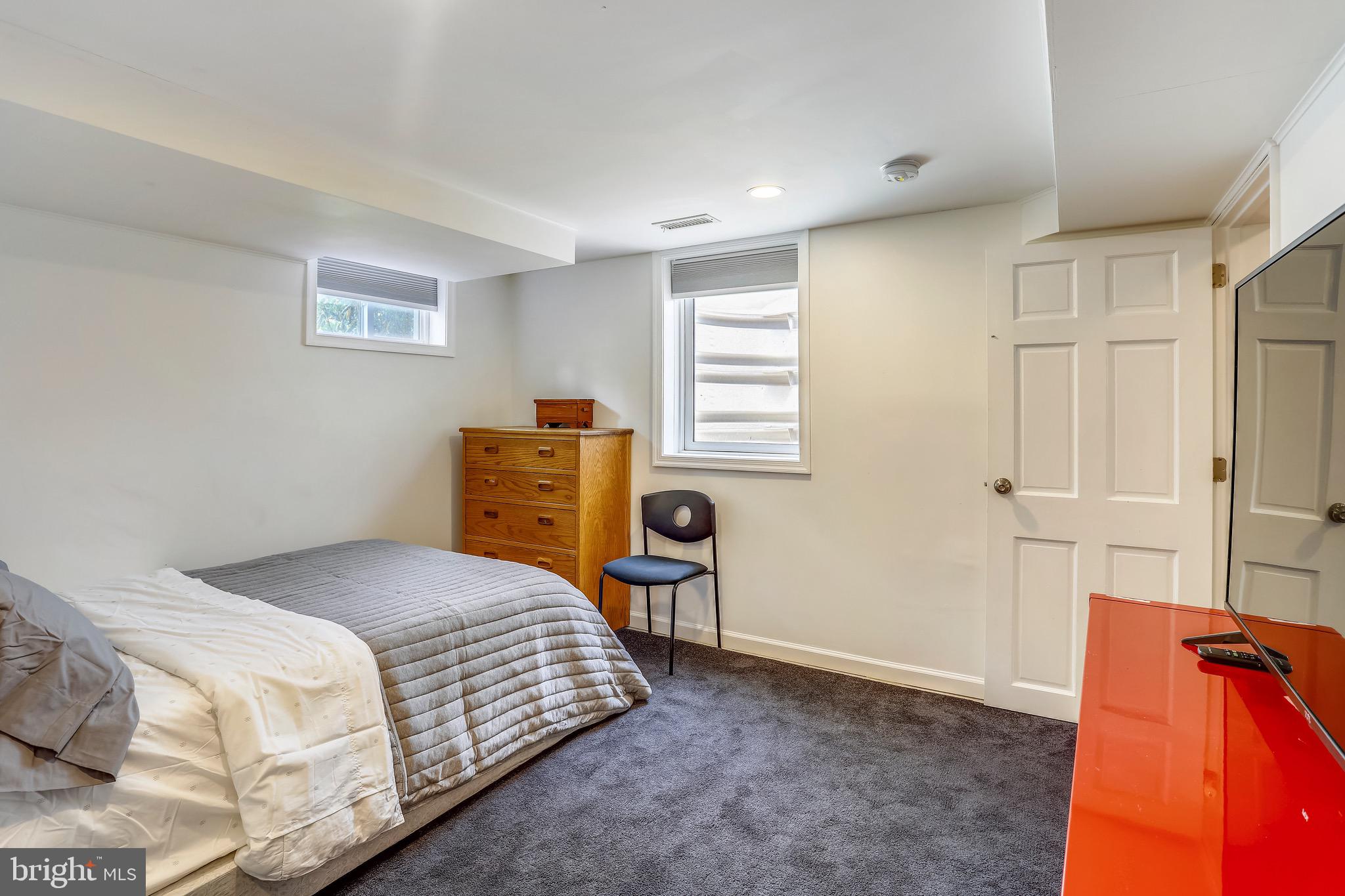 8636 Melwood Road Bethesda, MD 20817 - Photo 27 of 36 Lower Level Bedroom w Natural Light