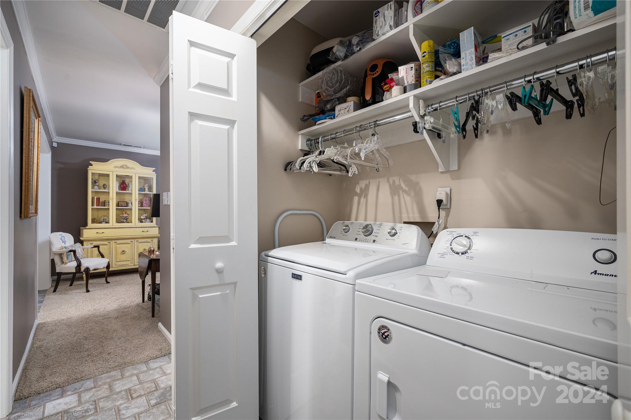 2009 Union Road, Unit E Gastonia, NC 28054 - Photo 13 of 17 a view of storage and utility room with washer and dryer