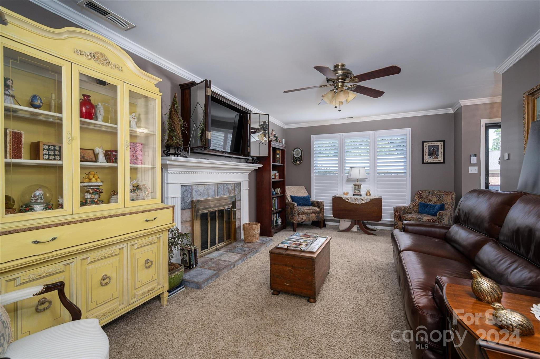 2009 Union Road, Unit E Gastonia, NC 28054 - Photo 5 of 17 a living room with furniture fireplace and flat screen tv