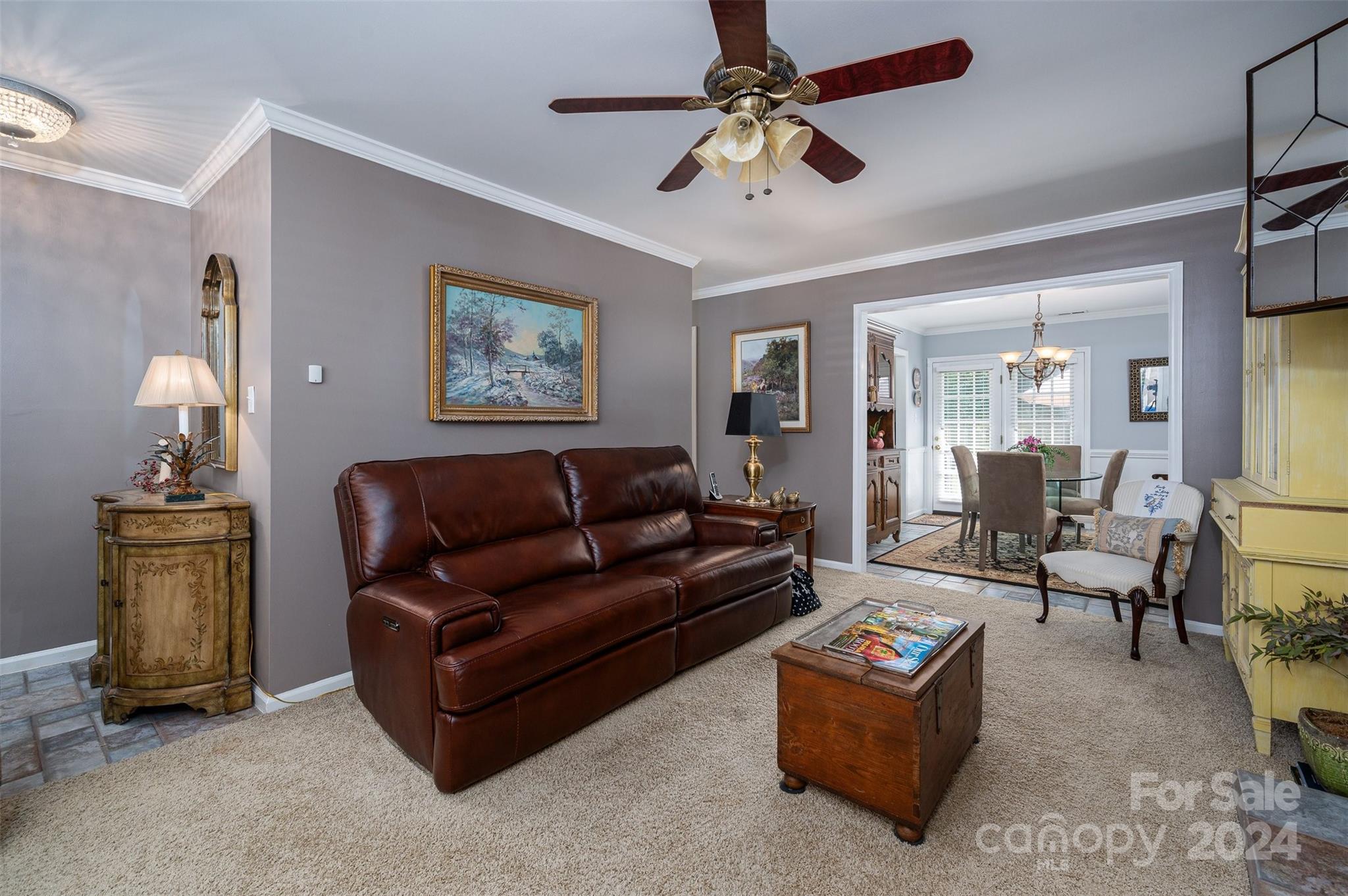 2009 Union Road, Unit E Gastonia, NC 28054 - Photo 6 of 17 a living room with furniture and a chandelier