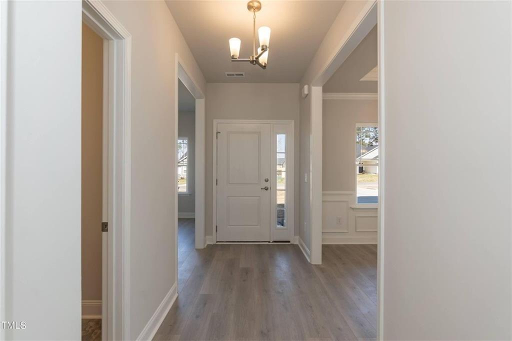 654 Bald Ridge Circle Demorest, GA 30535 - Photo 2 of 22 a view of a hallway with wooden floor and a bathroom