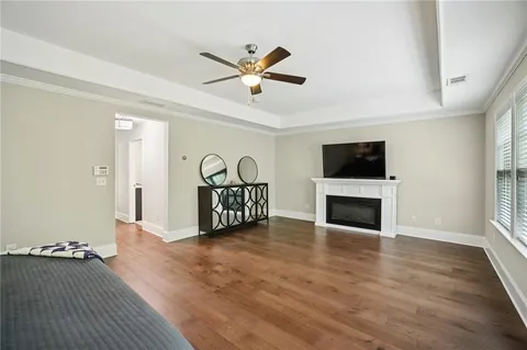 a view of livingroom with hardwood floor and a ceiling fan