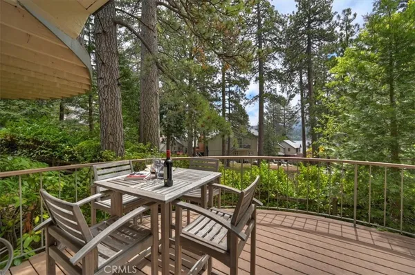a view of a patio with a table chairs and a table