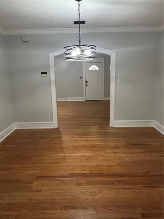 a view of a chandelier fan in a room