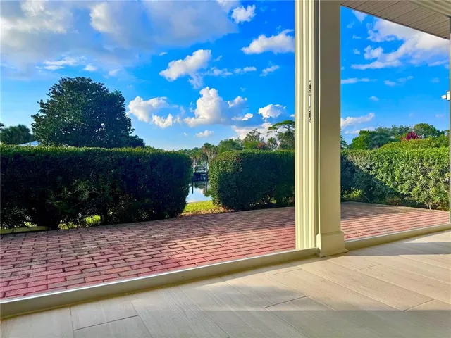 a bedroom with a bed and flat screen tv