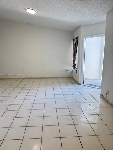 a view of a window and a wooden floor