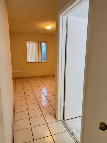 a bathroom with a shower and a toilet