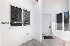 a kitchen with a stove and a microwave