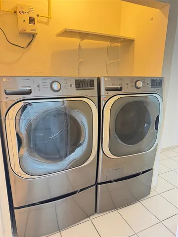 a view of a bathroom with washing machine