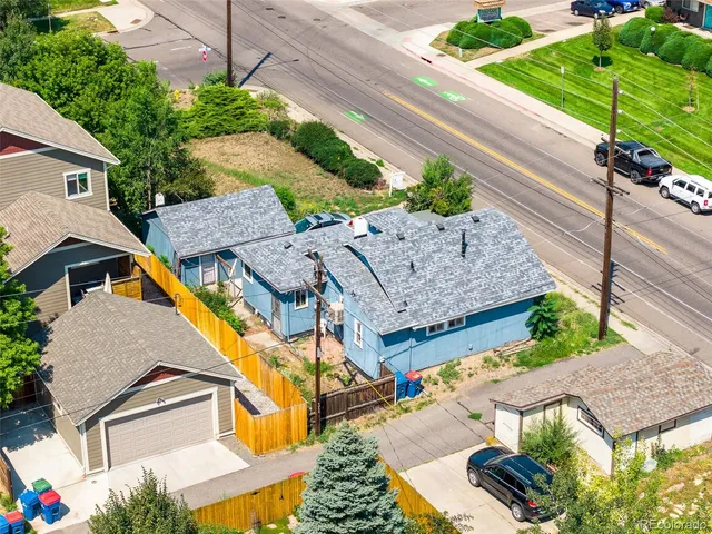 an aerial view of residential house with outdoor space