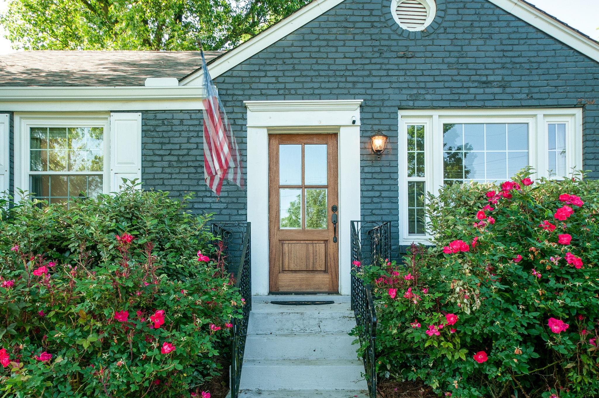 521 Hogan Road Nashville, TN 37220 - Photo 2 of 27 Painted brick exterior