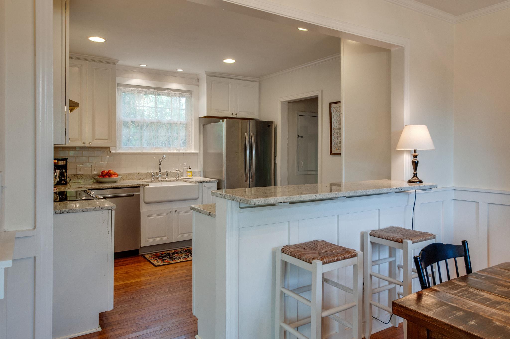 521 Hogan Road Nashville, TN 37220 - Photo 6 of 27 Open Kitchen into Dining Room