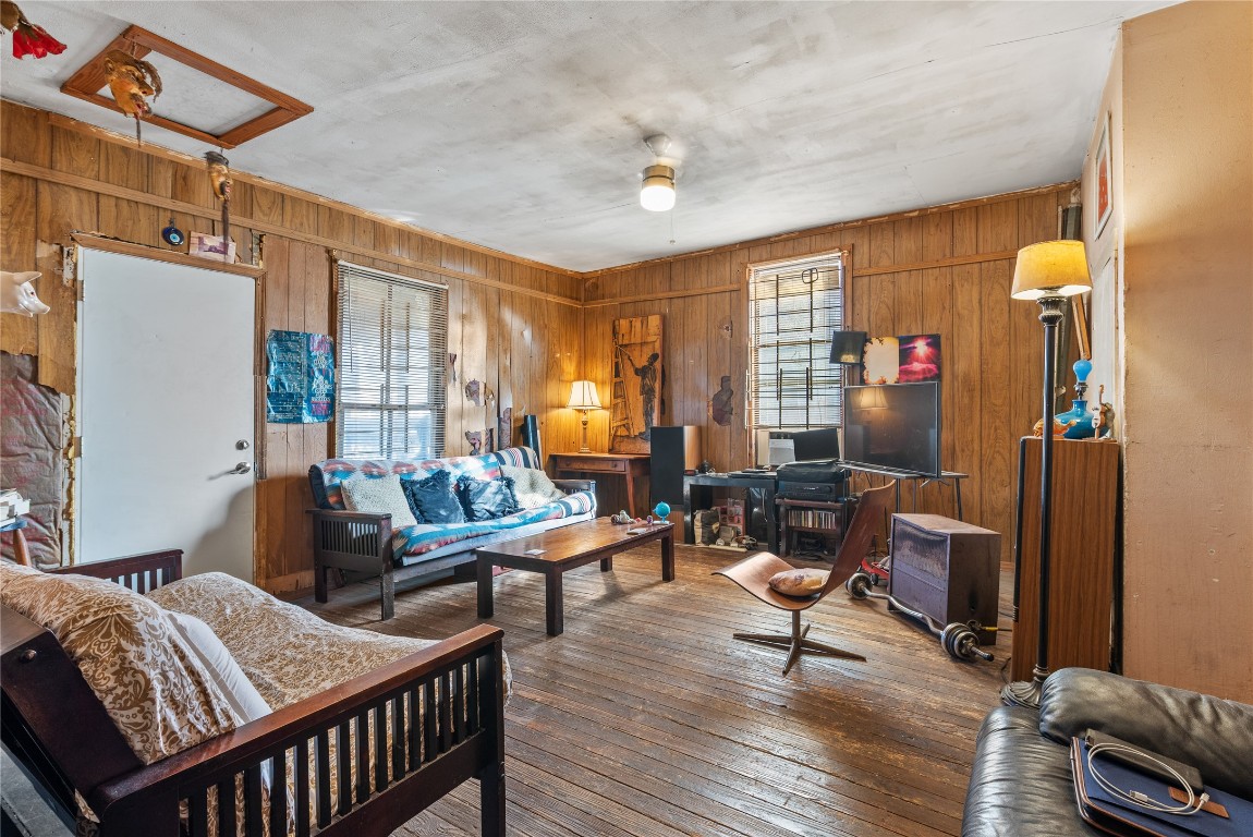 1001 Catalpa Street Austin, TX 78702 - Photo 5 of 10 a living room with furniture a rug and a window