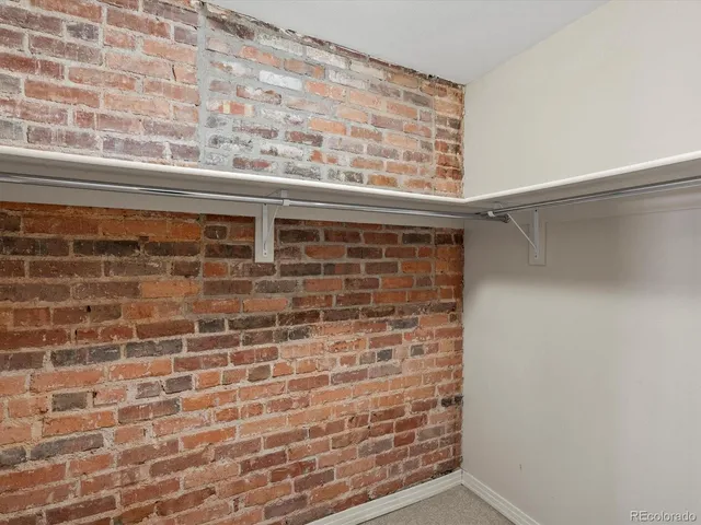 a bathroom with a bathtub a sink a vanity and a mirror