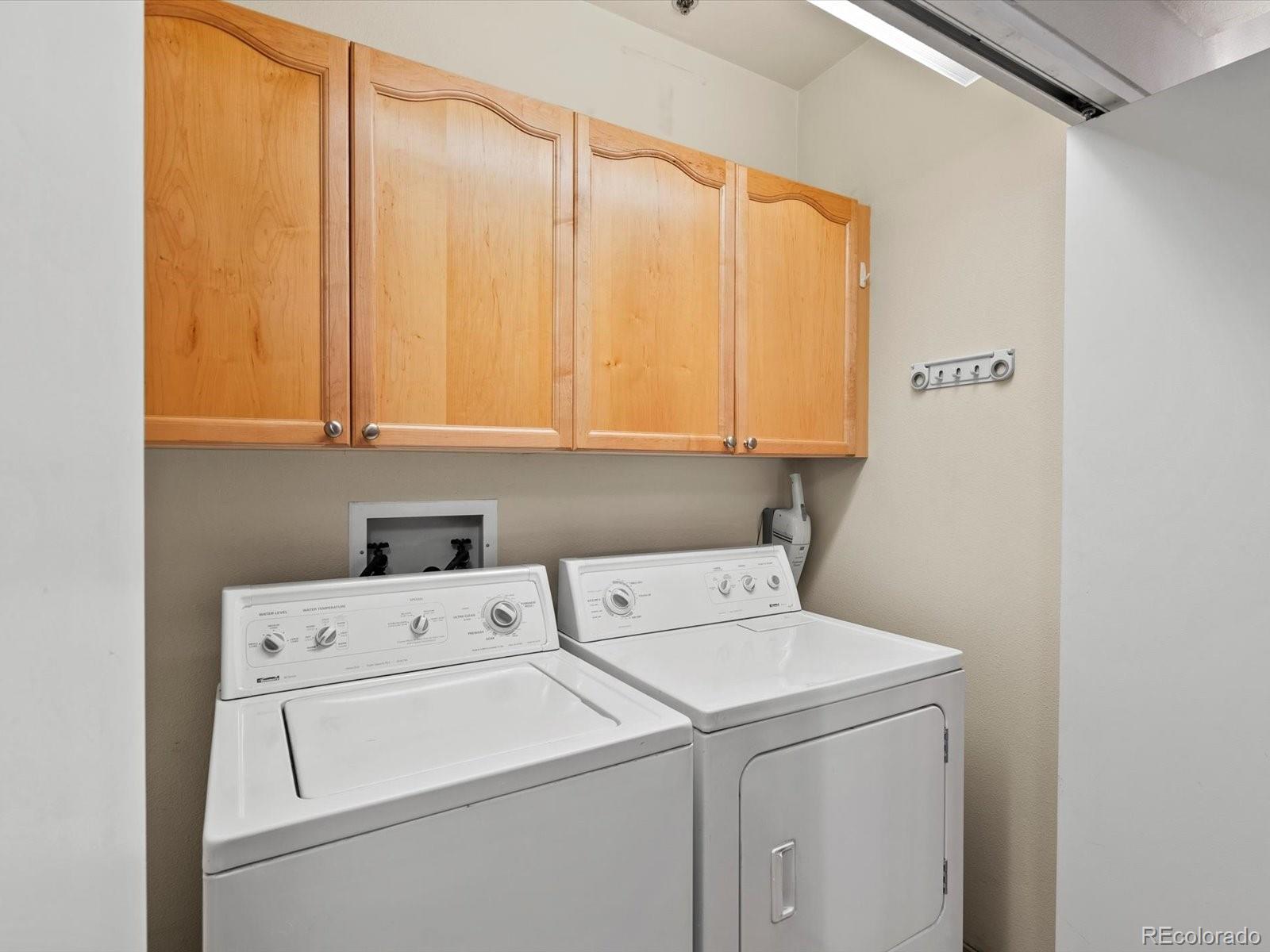 225 Lincoln Street, Unit 4 Denver, CO 80203 - Photo 28 of 34 a utility room with dryer and washer