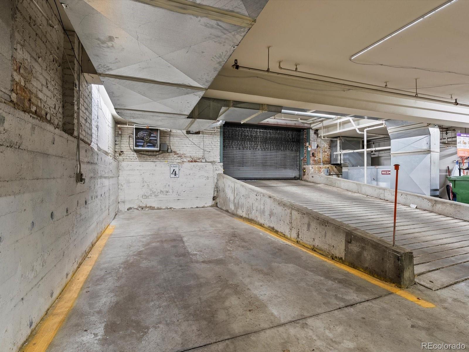 225 Lincoln Street, Unit 4 Denver, CO 80203 - Photo 32 of 34 a view of a car garage