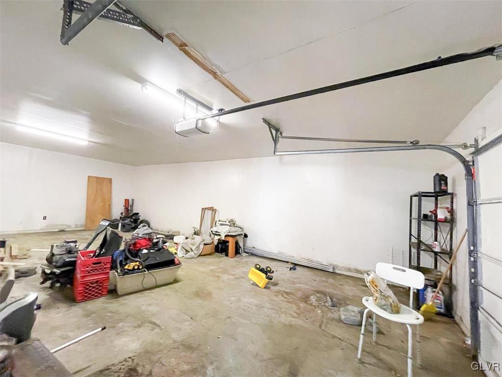 4111 Mauch Chunk Road Coplay, PA 18037 - Photo 15 of 43 a view of a garage with a table and chairs