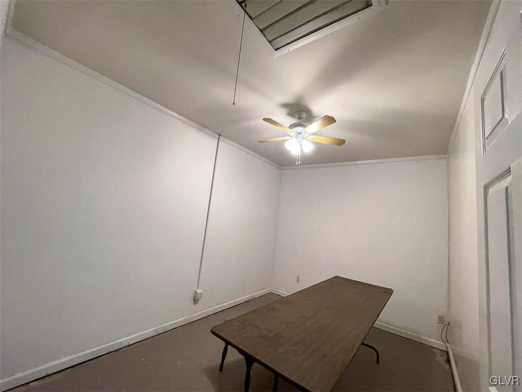 4111 Mauch Chunk Road Coplay, PA 18037 - Photo 16 of 43 a view of a room that has a fan and a plant in it