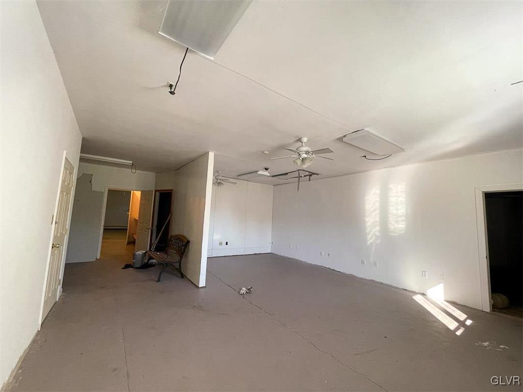 4111 Mauch Chunk Road Coplay, PA 18037 - Photo 17 of 43 a view of a room with gym equipment and a window